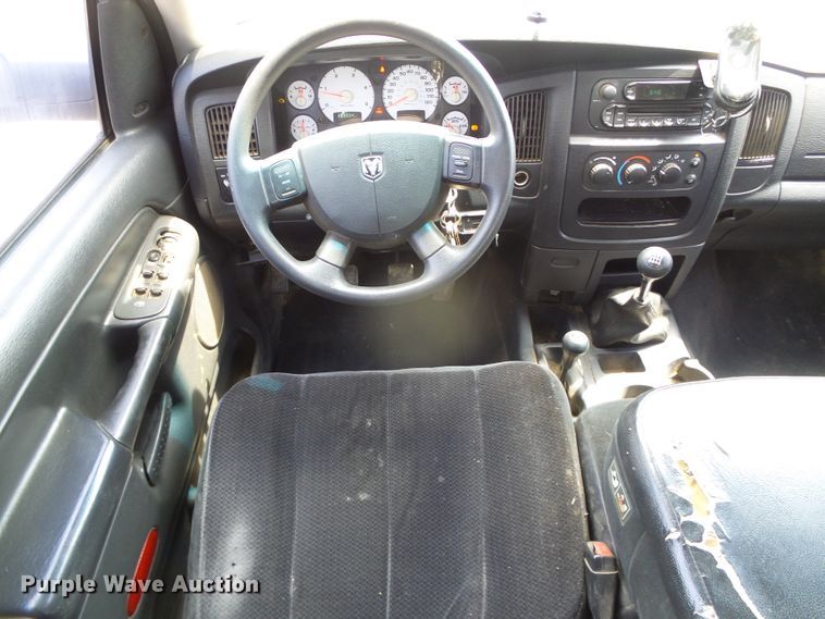 image for item DC5066 2005 Dodge Ram 3500 Quad Cab flatbed pickup truck