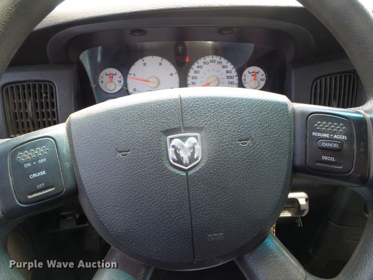 image for item DC5066 2005 Dodge Ram 3500 Quad Cab flatbed pickup truck