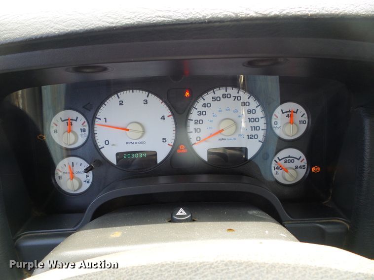 image for item DC5066 2005 Dodge Ram 3500 Quad Cab flatbed pickup truck