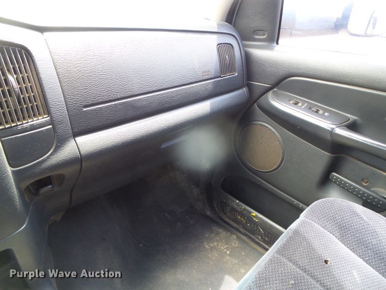 image for item DC5066 2005 Dodge Ram 3500 Quad Cab flatbed pickup truck