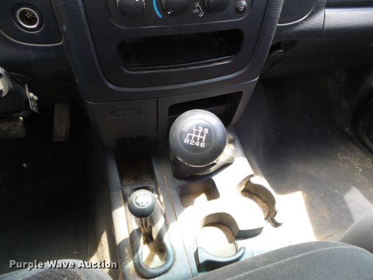 image for item DC5066 2005 Dodge Ram 3500 Quad Cab flatbed pickup truck