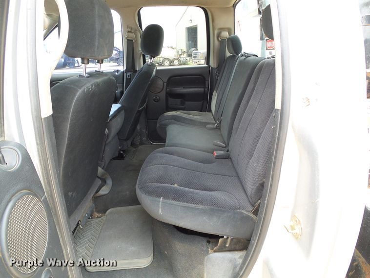 image for item DC5066 2005 Dodge Ram 3500 Quad Cab flatbed pickup truck