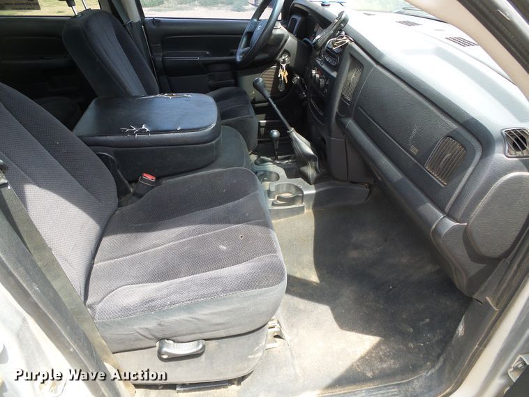 image for item DC5066 2005 Dodge Ram 3500 Quad Cab flatbed pickup truck