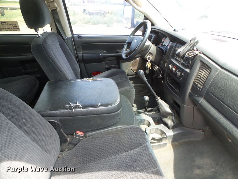 image for item DC5066 2005 Dodge Ram 3500 Quad Cab flatbed pickup truck