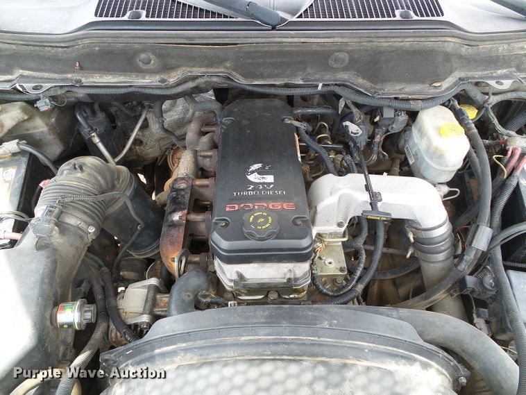 image for item DC5066 2005 Dodge Ram 3500 Quad Cab flatbed pickup truck