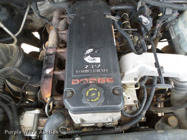 image for item DC5066 2005 Dodge Ram 3500 Quad Cab flatbed pickup truck