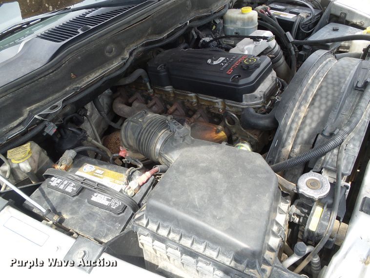 image for item DC5066 2005 Dodge Ram 3500 Quad Cab flatbed pickup truck