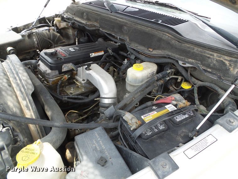 image for item DC5066 2005 Dodge Ram 3500 Quad Cab flatbed pickup truck