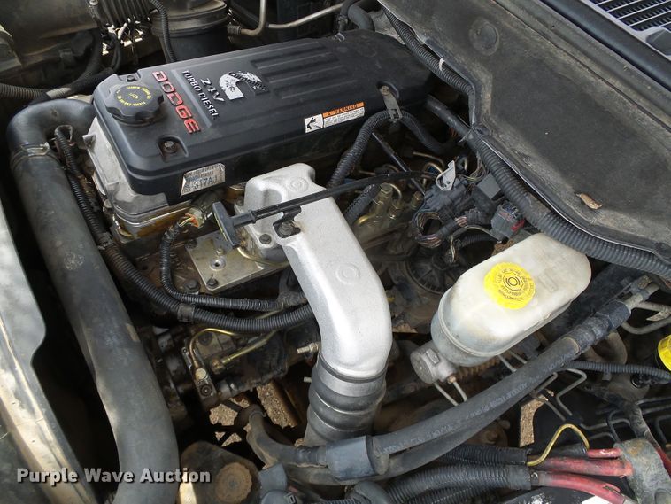 image for item DC5066 2005 Dodge Ram 3500 Quad Cab flatbed pickup truck