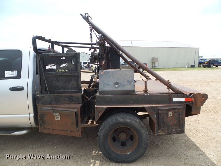 image for item DC5066 2005 Dodge Ram 3500 Quad Cab flatbed pickup truck