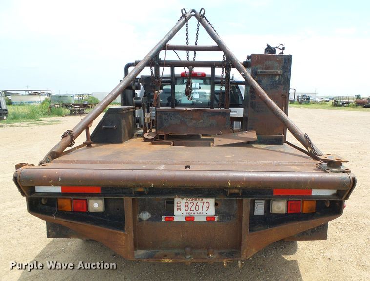 image for item DC5066 2005 Dodge Ram 3500 Quad Cab flatbed pickup truck