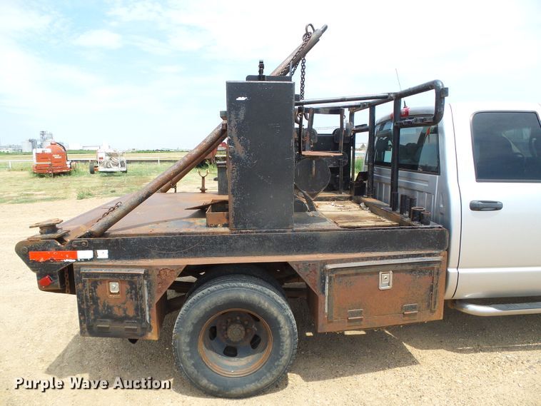 image for item DC5066 2005 Dodge Ram 3500 Quad Cab flatbed pickup truck