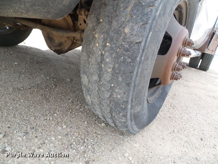 image for item DC5066 2005 Dodge Ram 3500 Quad Cab flatbed pickup truck