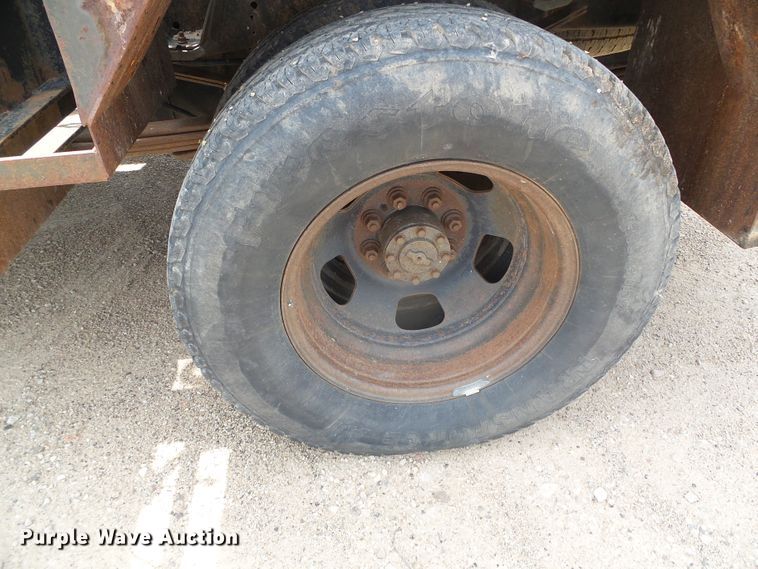 image for item DC5066 2005 Dodge Ram 3500 Quad Cab flatbed pickup truck