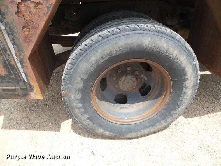 image for item DC5066 2005 Dodge Ram 3500 Quad Cab flatbed pickup truck