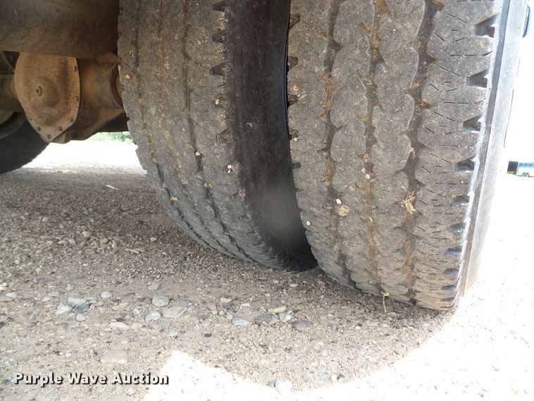 image for item DC5066 2005 Dodge Ram 3500 Quad Cab flatbed pickup truck