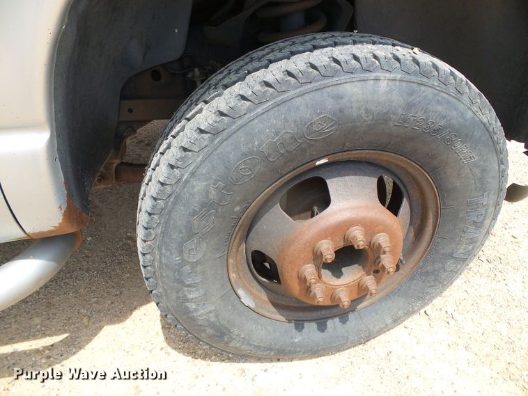 image for item DC5066 2005 Dodge Ram 3500 Quad Cab flatbed pickup truck