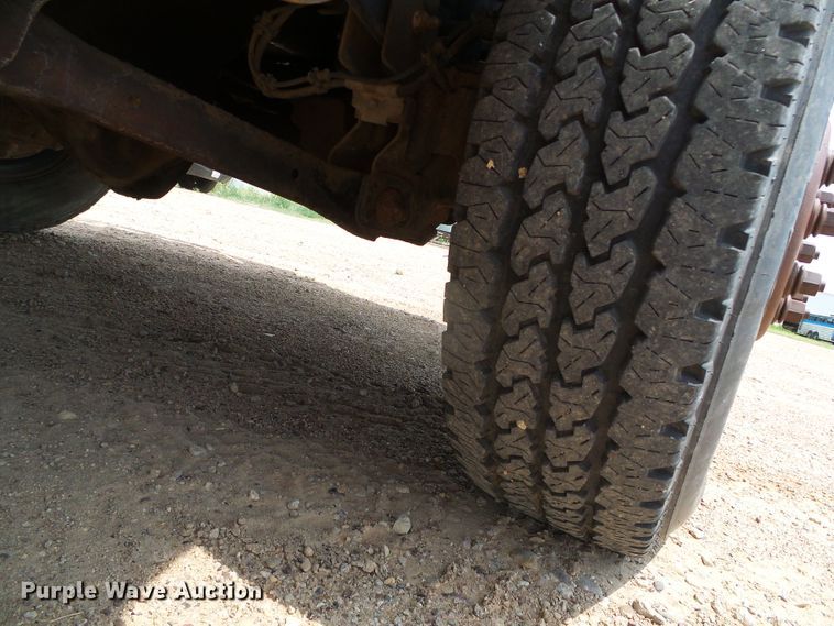 image for item DC5066 2005 Dodge Ram 3500 Quad Cab flatbed pickup truck