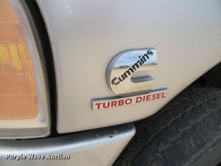 image for item DC5066 2005 Dodge Ram 3500 Quad Cab flatbed pickup truck