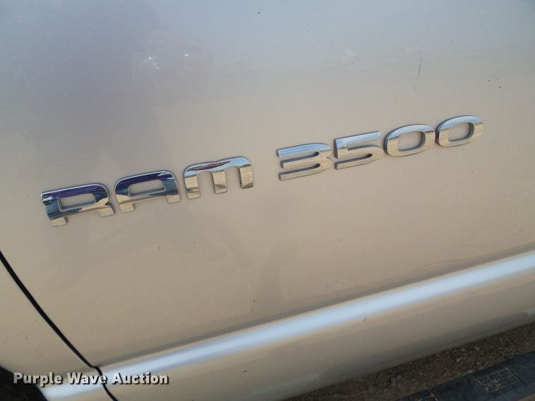 image for item DC5066 2005 Dodge Ram 3500 Quad Cab flatbed pickup truck