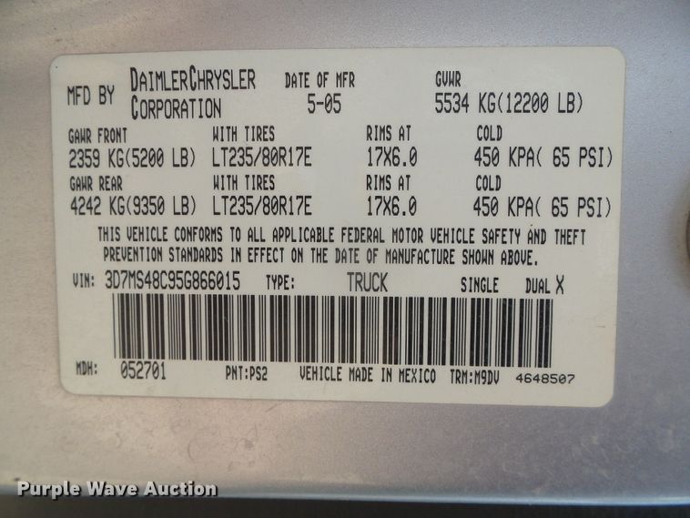 image for item DC5066 2005 Dodge Ram 3500 Quad Cab flatbed pickup truck