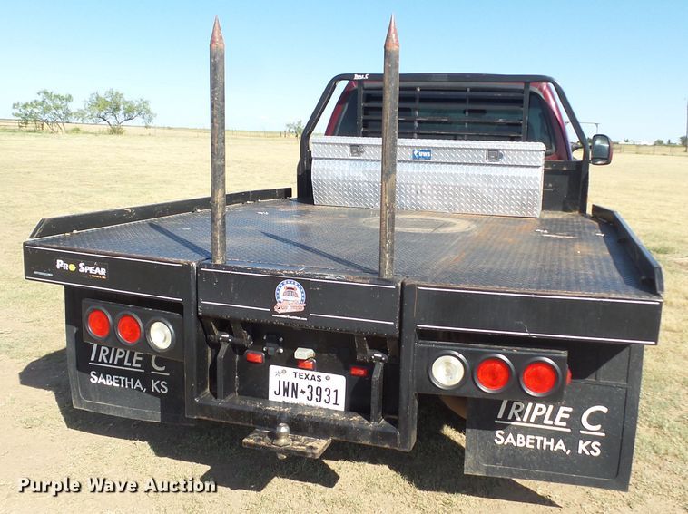 image for item DI0751 2005 Ford F350 Super Duty Crew Cab bale bed pickup truck