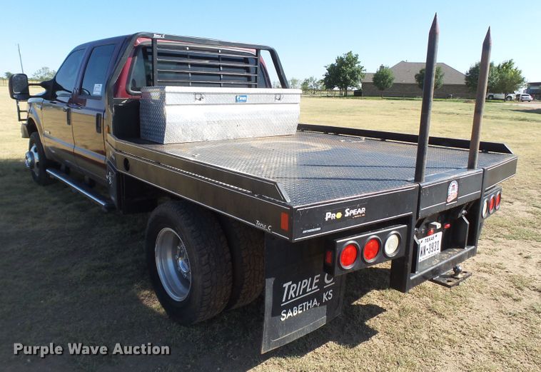 image for item DI0751 2005 Ford F350 Super Duty Crew Cab bale bed pickup truck