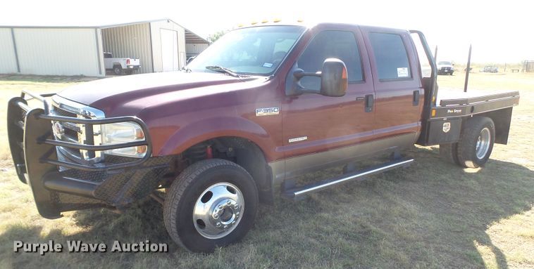 image for item DI0751 2005 Ford F350 Super Duty Crew Cab bale bed pickup truck