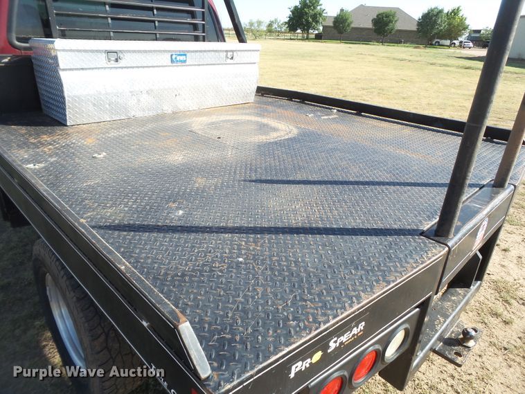 image for item DI0751 2005 Ford F350 Super Duty Crew Cab bale bed pickup truck