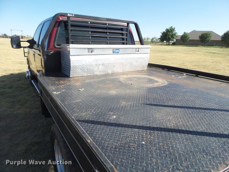 image for item DI0751 2005 Ford F350 Super Duty Crew Cab bale bed pickup truck