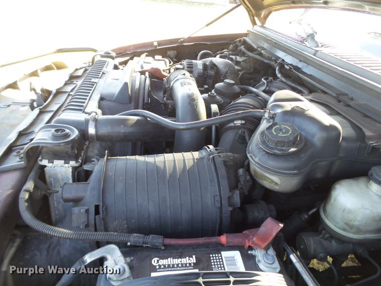 image for item DI0751 2005 Ford F350 Super Duty Crew Cab bale bed pickup truck