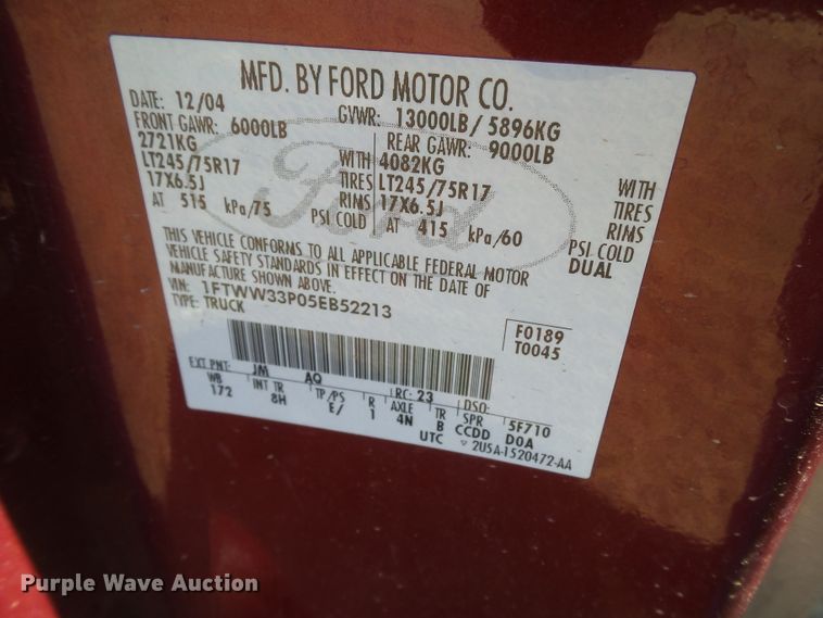 image for item DI0751 2005 Ford F350 Super Duty Crew Cab bale bed pickup truck