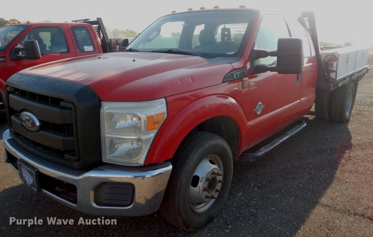 image for item DI2260 2011 Ford F350 Super Duty SuperCab flatbed pickup truck