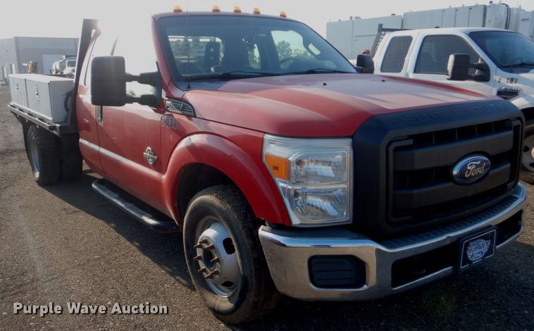 image for item DI2260 2011 Ford F350 Super Duty SuperCab flatbed pickup truck