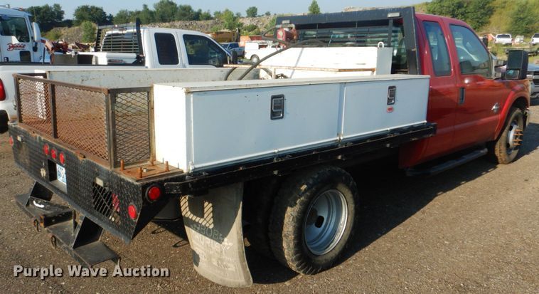 image for item DI2260 2011 Ford F350 Super Duty SuperCab flatbed pickup truck