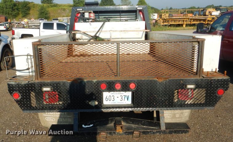 image for item DI2260 2011 Ford F350 Super Duty SuperCab flatbed pickup truck