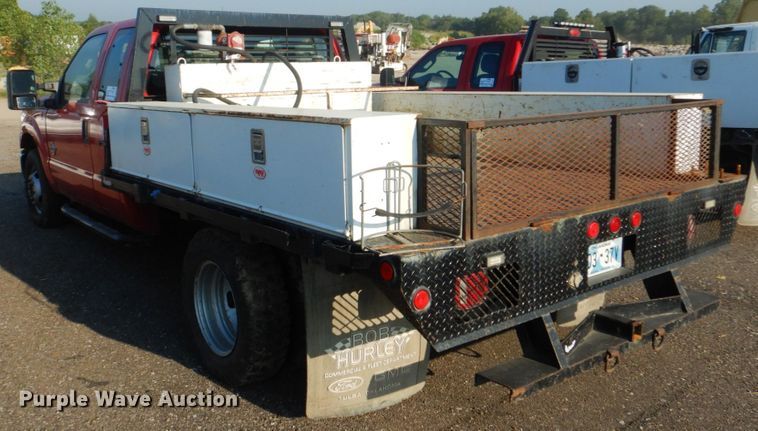 image for item DI2260 2011 Ford F350 Super Duty SuperCab flatbed pickup truck