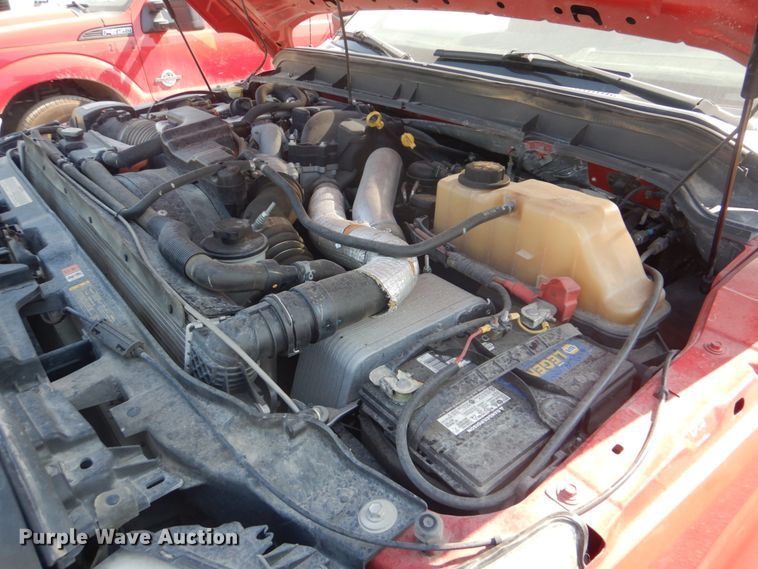 image for item DI2260 2011 Ford F350 Super Duty SuperCab flatbed pickup truck