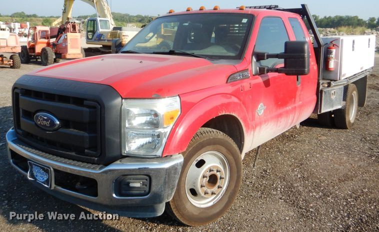 image for item DI2261 2011 Ford F350 Super Duty SuperCab flatbed pickup truck