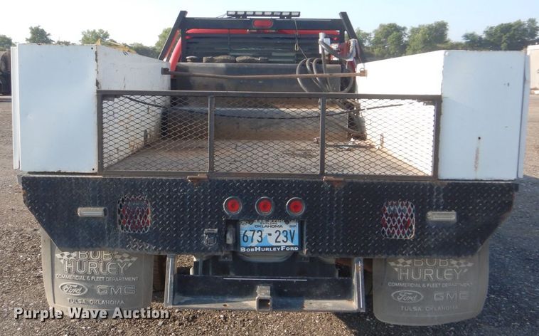 image for item DI2261 2011 Ford F350 Super Duty SuperCab flatbed pickup truck