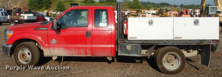 image for item DI2261 2011 Ford F350 Super Duty SuperCab flatbed pickup truck