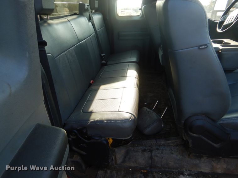 image for item DI2261 2011 Ford F350 Super Duty SuperCab flatbed pickup truck