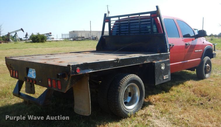 image for item FC9756 2003 Dodge Ram 3500 Quad Cab flatbed pickup truck