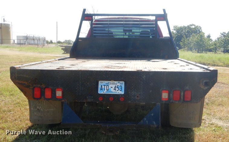 image for item FC9756 2003 Dodge Ram 3500 Quad Cab flatbed pickup truck