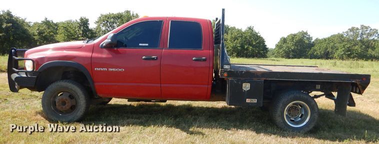 image for item FC9756 2003 Dodge Ram 3500 Quad Cab flatbed pickup truck