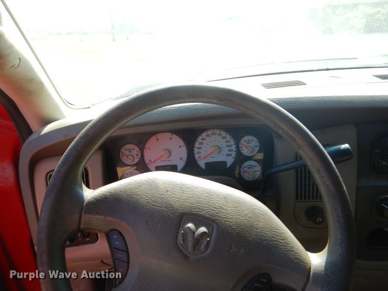 image for item FC9756 2003 Dodge Ram 3500 Quad Cab flatbed pickup truck