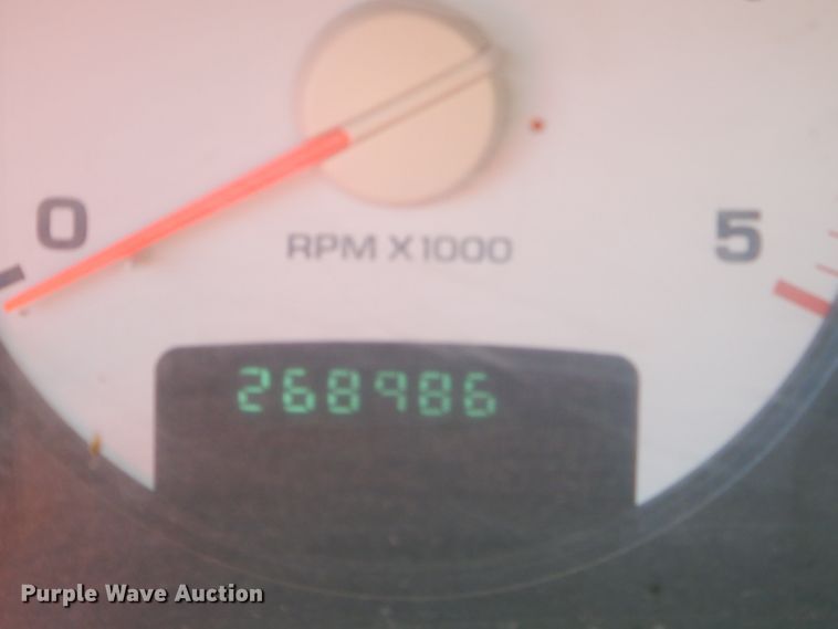 image for item FC9756 2003 Dodge Ram 3500 Quad Cab flatbed pickup truck