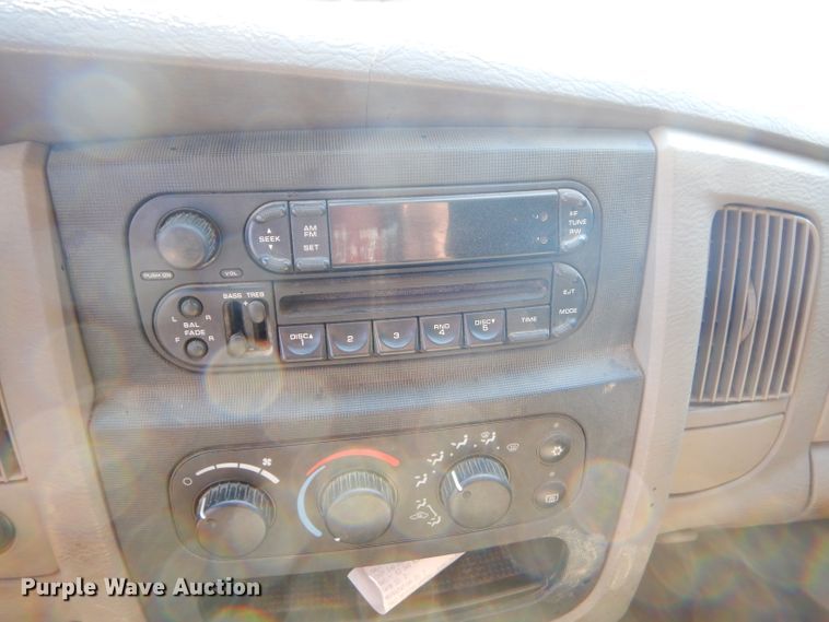 image for item FC9756 2003 Dodge Ram 3500 Quad Cab flatbed pickup truck