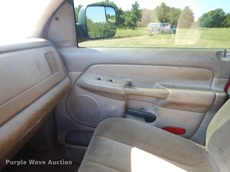 image for item FC9756 2003 Dodge Ram 3500 Quad Cab flatbed pickup truck