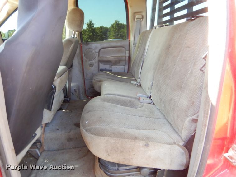 image for item FC9756 2003 Dodge Ram 3500 Quad Cab flatbed pickup truck